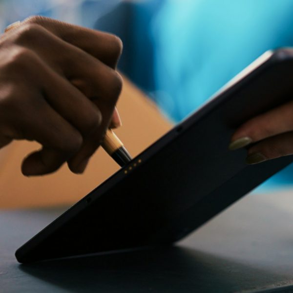 Courier signing shipment document